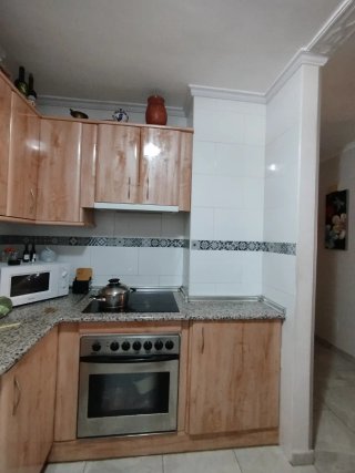 Muebles de cocina madera y cristal