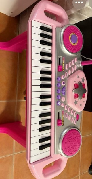 Piano infantil rosa como nuevo