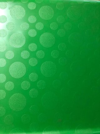 Bandeja verde con círculos para ordenador