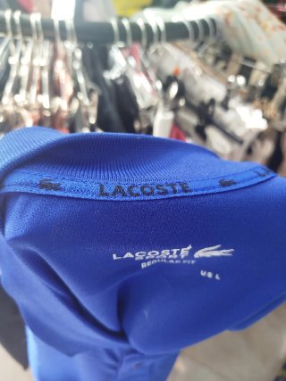 Polo Lacoste Talla L Azul con Mangas Estampadas