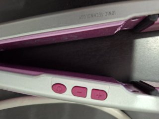 Plancha de pelo Grundig rosa y plateada