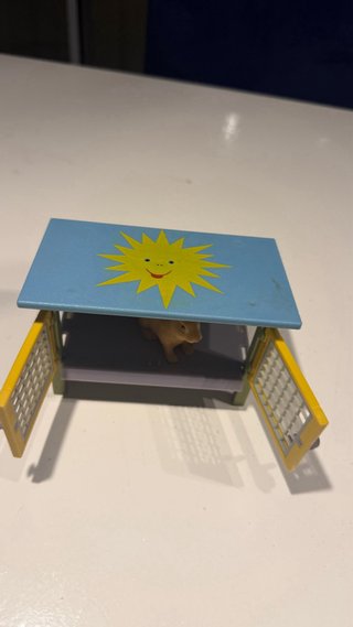 Juego de figuras de animales una casa jaula