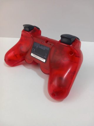 Mando ps3 rojo traslúcido.