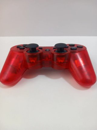 Mando ps3 rojo traslúcido.