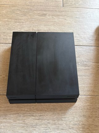 Consola PS4 Sony Negra con mando total mente nueva