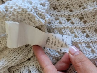 Chaqueta de punto beige calada