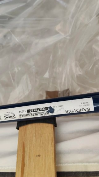 Cama supletoria plegable azul y blanca