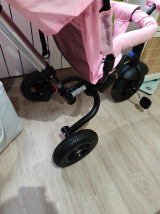 Triciclo infantil rosa de paseo