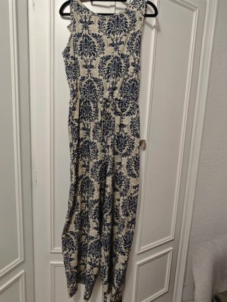 Mono estampado floral beige y azul