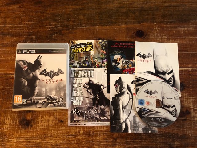 Batman Arkham City PS3 + Piratas del Caribe