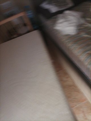 Cuna de bebé de madera y tela de IKEA