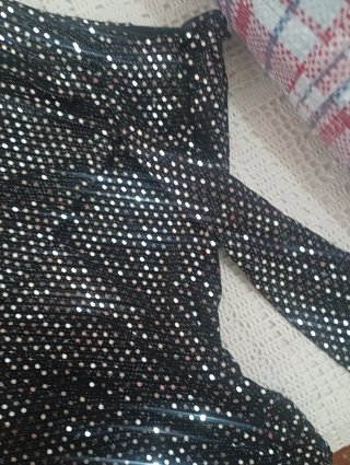 Pantalón corto lentejuelas negro y plata