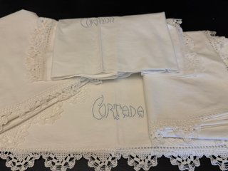Sábana y funda de almohada antiguas bordadas