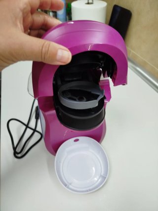 Cafetera Bosch morada y Blanca