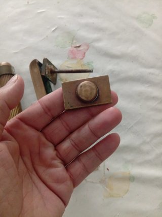 Maniglia e batti porta in ottone
