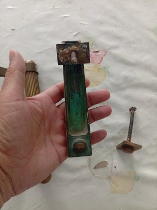 Maniglia e batti porta in ottone