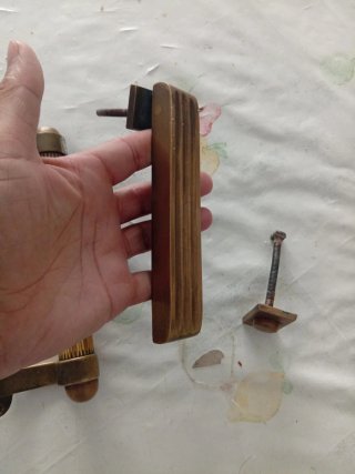 Maniglia e batti porta in ottone