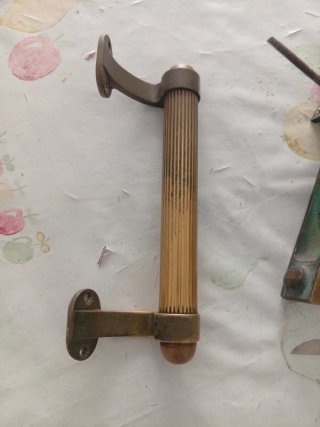 Maniglia e batti porta in ottone