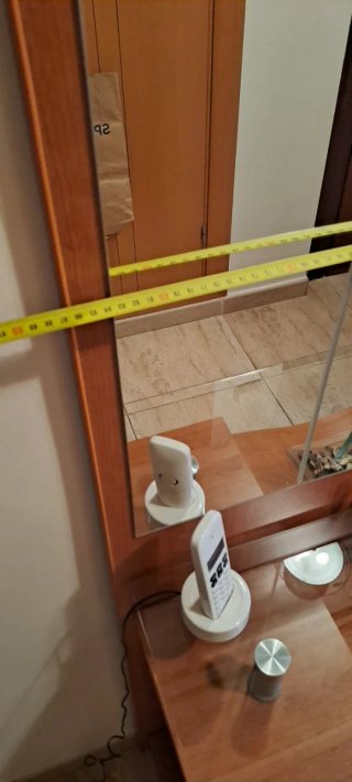 Recibidor de madera y cristal