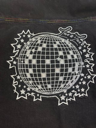 Chaqueta vaquera negra orgullo gay