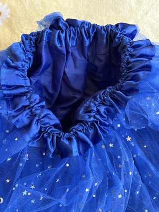 Falda tutú azul con estrellas plateadas