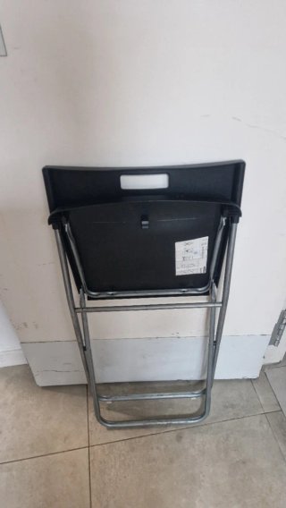 Silla plegable negra como nueva