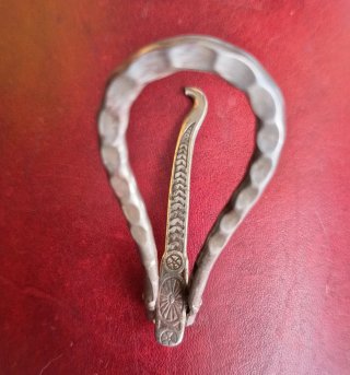 Antiguo gancho abotonador de viaje