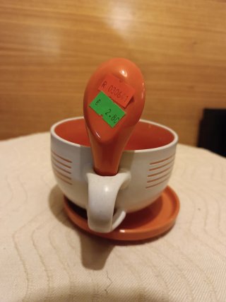 Taza de desayuno con platillo y cuchara