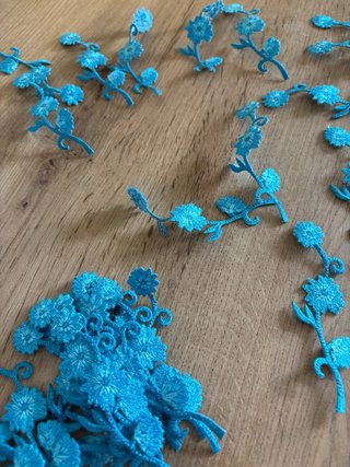 Set di applicazioni floreali per abbigliamento blu