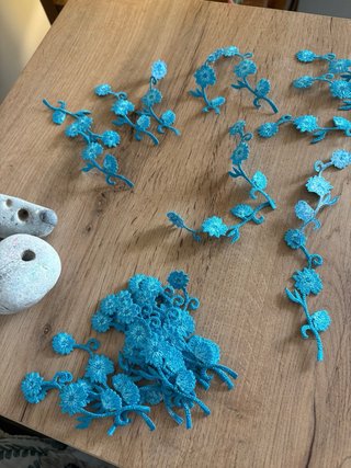 Set di applicazioni floreali per abbigliamento blu