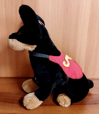 Peluche cane nero e marrone