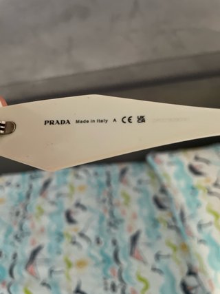 Occhiali Prada bianchi con scatola