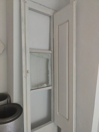 Puerta antigua de balcón restaurar