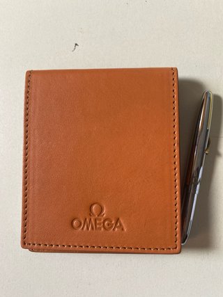 Bloc de notas y bolígrafo Omega, de bolsillo