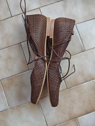 Zapatos planos de cuero trenzado y cordones