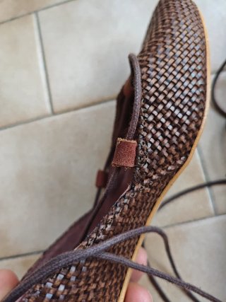 Zapatos planos de cuero trenzado y cordones