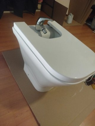 Lavabo y bidet completos con grifos