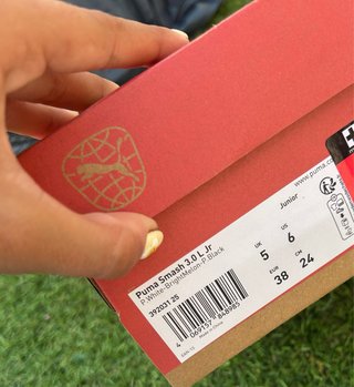 Zapatillas Puma Blancas con Detalles Naranja