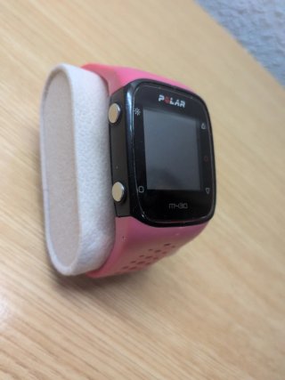 Reloj Polar M430 con correa rosa.