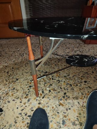Mesa de centro ovalada mármol y madera