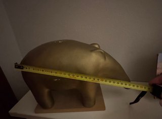 Salvadanaio a forma di tapiro dorato
