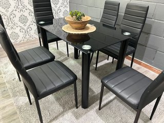 Mesa de comedor negra con 6 sillas
