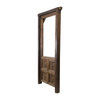 Puerta de nogal con cuarterones