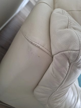 Sofá de piel beige 2 plazas