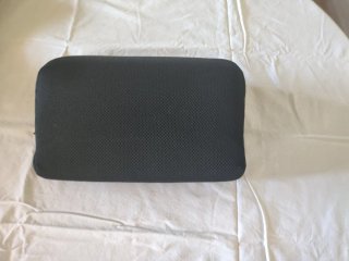 Cojín cervical de tela negro