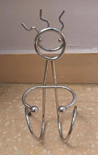 2 Soportes para mandos/teléfonos  de metal.