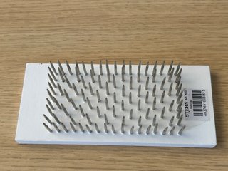 Tabla con púas para posticería