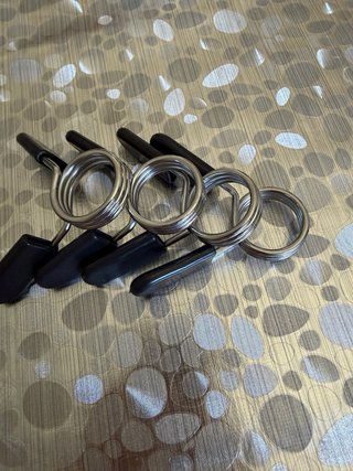 Pinzas para barra de pesas 28 MM.