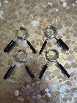 Pinzas para barra de pesas 28 MM.