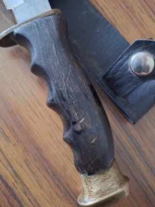 Navaja de bolsillo con funda de cuero